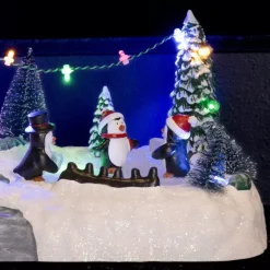 Scena della vita illuminata Aera giochi dei pinguini a pile